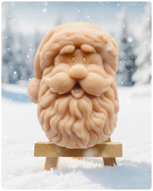 Handmade vegan traditional Santa Claus face shaped vegan soaps.  crafted with natural French clays, activated charcoal and essential oils. a eco-friendly, zero waste gift that’s cruelty-free, skin-nourishing, and perfect for Christmas gifts, secret Santa and stocking fillers. Small business UK