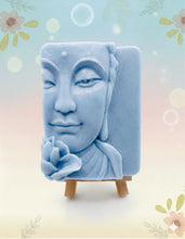 Load image into Gallery viewer, Handmade vegan soaps featuring a beautiful buddha and lotus flower and wrapped in beautiful eco friendly packaging crafted with natural French clays, activated charcoal and essential oils. a eco-friendly, zero waste gift that’s cruelty-free, skin-nourishing, and perfect gift for buddha lovers. small business UK
