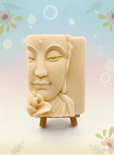 Load image into Gallery viewer, Handmade vegan soaps featuring a beautiful buddha and lotus flower and wrapped in beautiful eco friendly packaging crafted with natural French clays, activated charcoal and essential oils. a eco-friendly, zero waste gift that’s cruelty-free, skin-nourishing, and perfect gift for buddha lovers. small business UK
