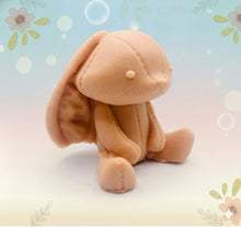 Load image into Gallery viewer, Handmade vegan soaps featuring an adorable rabbit with big floppy ears and stitching detail, in beautiful eco friendly packaging. crafted with natural French clays, activated charcoal and essential oils. a eco-friendly, zero waste gift that’s cruelty-free, skin-nourishing, the perfect gift for easter or for animal lovers. small business UK
