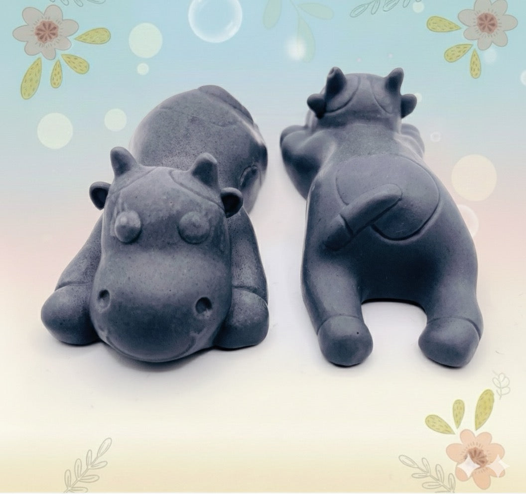 Handmade vegan soaps featuring a set of two sleeping cows . gift boxed in beautiful eco friendly packaging. crafted with natural French clays, activated charcoal and essential oils. a eco-friendly, zero waste gift that’s cruelty-free, skin-nourishing, the perfect gift for cow lovers and animal lovers. UK Small Business 