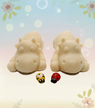 Load image into Gallery viewer, Handmade vegan soaps featuring a set of two sleeping cows . gift boxed in beautiful eco friendly packaging. crafted with natural French clays, activated charcoal and essential oils. a eco-friendly, zero waste gift that’s cruelty-free, skin-nourishing, the perfect gift for cow lovers and animal lovers. UK Small Business 
