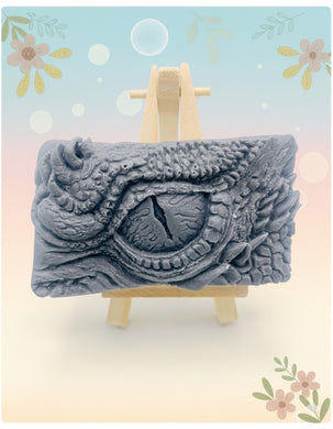 dragon Gift | dragon eye gift, dino gift, alternative gift, Dragon / Dinosaur Eye Vegan Soap Wooden display easels are available to purchase on a separate listing  Calling all fantasy lovers! Step into a realm of mystical charm with our captivating dragon / dinosaur eye soap. This soap is vegan, cruelty free and available in your choice of colour and essential oil. All our soaps are made with natural clays and essential oils to gently cleanse and nourish your skin. eco conscious gift