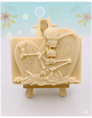 Handmade vegan soaps featuring a  skeleton dancing on his RIP grave. crafted with natural French clays, activated charcoal and essential oils. a eco-friendly, zero waste gift that’s cruelty-free, skin-nourishing, and perfect for skull lovers and Halloween gifting . Small business UK