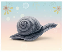 Load image into Gallery viewer, Handmade vegan soaps featuring a detailed snail, in beautiful eco friendly packaging. crafted with natural French clays, activated charcoal and essential oils. a eco-friendly, zero waste gift that’s cruelty-free, skin-nourishing, the perfect gift for snail lovers, gardeners or for animal lovers. small business UK
