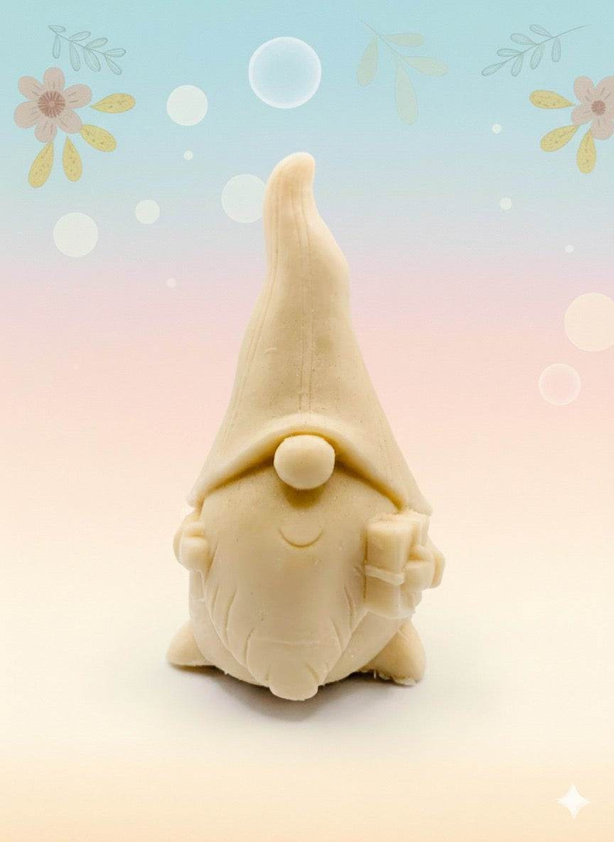 Handmade vegan soaps featuring a gorgeous gnome holding a gift in his hand packed in beautiful eco friendly packaging. crafted with natural French clays, activated charcoal and essential oils. a eco-friendly, zero waste gift that’s cruelty-free, skin-nourishing, the perfect gift for gnome lovers, Christmas gifts or for animal lover gifts. small business UK