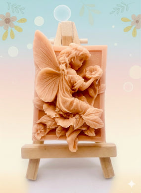 Handmade vegan soaps featuring a fairy sitting on leaves and holding a flower in beautiful eco friendly packaging. crafted with natural French clays, activated charcoal and essential oils. a eco-friendly, zero waste gift that’s cruelty-free, skin-nourishing, the perfect gift for fairy lovers or mothers day. small business UK