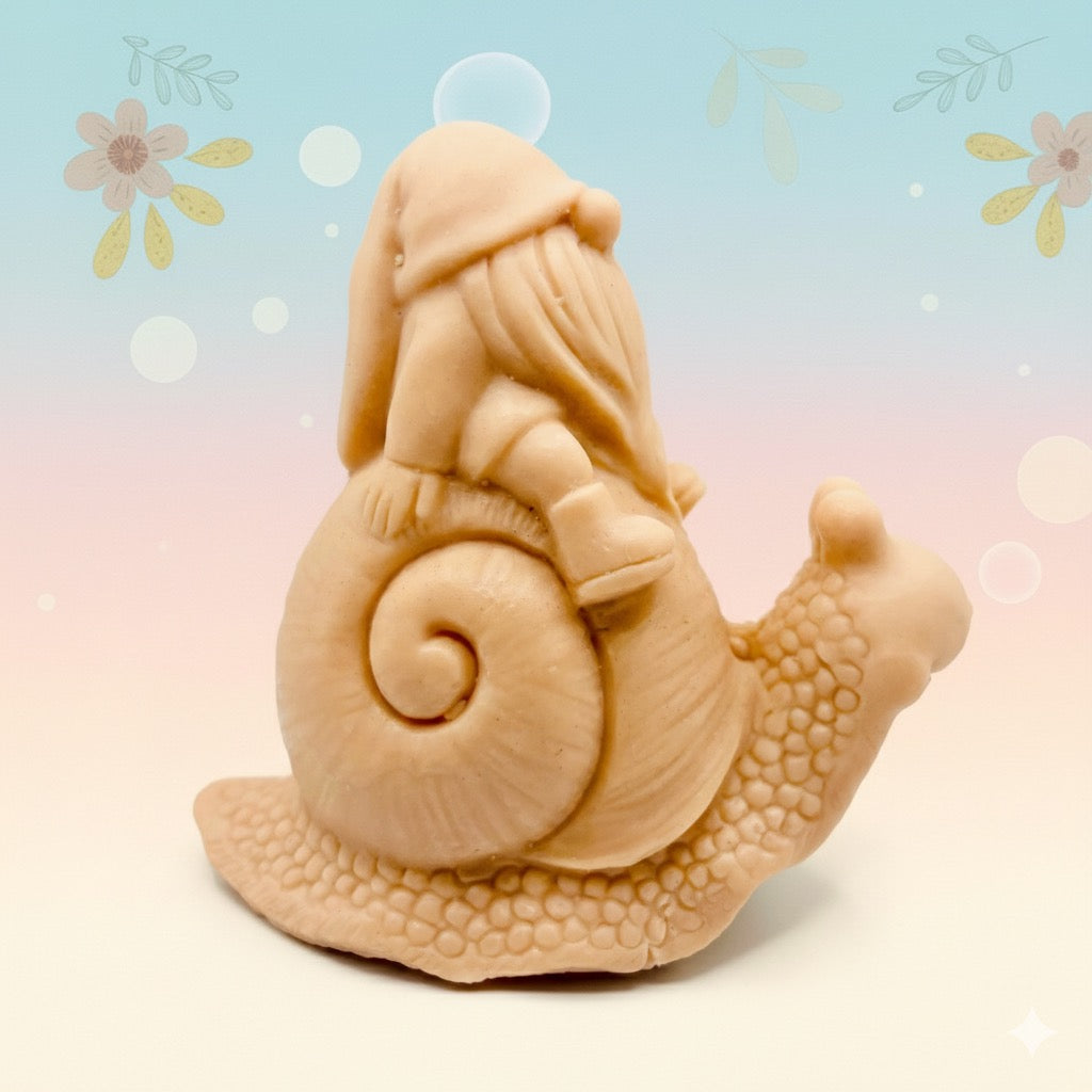 Handmade vegan soaps featuring a detailed snail with a gnome catching a ride on his back soap. crafted with natural French clays, activated charcoal and essential oils. a eco-friendly, zero waste gift that’s cruelty-free, skin-nourishing, and perfect for turtle lovers and gnome lover gifts. small business UK