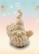 Load image into Gallery viewer, Handmade vegan soaps featuring a gorgeous gnome holding a bunch of flowers in one hand and waving with the other hand. beautiful eco friendly packaging. crafted with natural French clays, activated charcoal and essential oils. a eco-friendly, zero waste gift that’s cruelty-free, skin-nourishing, and perfect for gnome lovers and gifting. UK Small Business 
