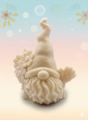 Handmade vegan soaps featuring a gorgeous gnome holding a bunch of flowers in one hand and waving with the other hand. beautiful eco friendly packaging. crafted with natural French clays, activated charcoal and essential oils. a eco-friendly, zero waste gift that’s cruelty-free, skin-nourishing, and perfect for gnome lovers and gifting. UK Small Business 