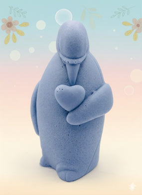 Handmade vegan soaps featuring a penguin holding a love heart  packaged in beautiful eco friendly packaging crafted with natural French clays, activated charcoal and essential oils. a eco-friendly, zero waste gift that’s cruelty-free, skin-nourishing, and perfect for penguin lovers, christmas gifts and animal themed gifts. small business UK