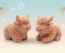 Load image into Gallery viewer, Handmade vegan soaps featuring a set of two chunky highland cow soaps, gift boxed .. crafted with natural French clays, activated charcoal and essential oils. a eco-friendly, zero waste gift that’s cruelty-free, skin-nourishing, and perfect for animal lover gifts and highland cow gifts for her. UK Small Business. 
