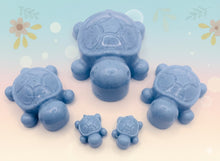 Load image into Gallery viewer, Handmade vegan soaps featuring a  set of 5 turtle family soaps and gift boxed in beautiful eco friendly packaging crafted with natural French clays, activated charcoal and essential oils. a eco-friendly, zero waste gift that’s cruelty-free, skin-nourishing, and perfect for turtle lovers and animal themed gifts. small business UK

