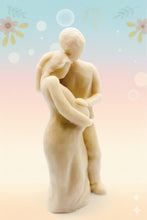 Load image into Gallery viewer, Handmade vegan soaps featuring a pregnant couple with the man gently embracing the woman and placing his hand on her stomach / bump . packaged in beautiful eco friendly packaging. crafted with natural French clays, activated charcoal and essential oils. a eco-friendly, zero waste gift that’s cruelty-free, skin-nourishing, the perfect gift for any new mother or baby shower gift. UK Small Business 
