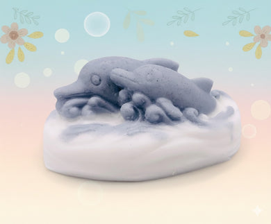 Dolphin Gift UK, Swimming Dolphins Vegan Soap Dive into a world of luxury with these playful dolphins, leaving you feeling refreshed and revitalised with every wash. Made with natural ingredients and gentle on the skin, our swimming dolphins soap is the perfect gift for anyone who loves the sea!  eco conscious gift eco friendly gift. zero waste 
zero waste gifts UK. handmade gifts UK. Handmade home style UK. BrIrish made. Handmade UK. Modern gifts UK. Vegan soap UK. 