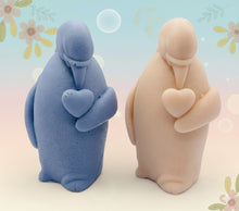 Load image into Gallery viewer, Handmade vegan soaps featuring a penguin holding a love heart  packaged in beautiful eco friendly packaging crafted with natural French clays, activated charcoal and essential oils. a eco-friendly, zero waste gift that’s cruelty-free, skin-nourishing, and perfect for penguin lovers, christmas gifts and animal themed gifts. small business UK
