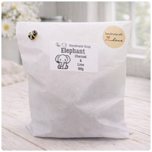 Load image into Gallery viewer, Handmade soap packaging with an elephant illustration and text on a white background

