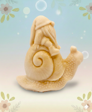 Load image into Gallery viewer, Handmade vegan soaps featuring a detailed snail with a gnome catching a ride on his back soap. crafted with natural French clays, activated charcoal and essential oils. a eco-friendly, zero waste gift that’s cruelty-free, skin-nourishing, and perfect for turtle lovers and gnome lover gifts. small business UK
