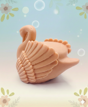 Load image into Gallery viewer, A beautiful handmade vegan soap in the shape of a graceful swan with detailed wing feathers, displayed against a whimsical background for an elegant farmhouse decor gift. 
