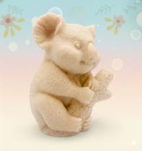 Load image into Gallery viewer, Handmade vegan soaps featuring a chunky koala bear climbing a tree packaged in beautiful eco friendly packaging crafted with natural French clays, activated charcoal and essential oils. a eco-friendly, zero waste gift that’s cruelty-free, skin-nourishing, and perfect for koala bear lovers and animal themed gifts. small business UK

