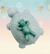 Load image into Gallery viewer, Turtle gift. Frog gift. Zero waste gift. Modern gift idea. Handmade home style. Slow and steady wins the race… especially when you’ve got a little frog friend catching a ride! 🐢💚 This adorable Turtle &amp; Frog Soap is handmade with love, gentle on the skin and kind to the planet! Guaranteed to raise a smile every time you use it!!! 😃 

