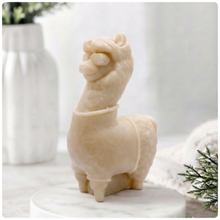 Load image into Gallery viewer, Decorative llama-shaped vegan soap on a white surface with a jar of lavender flowers in the background.
