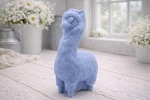 Load image into Gallery viewer, handmade vegan soap in the shape of a realistic standing alpaca or llama sculpture, featuring a smooth body with detailed fur texture on the head and neck, displayed in a bright farmhouse decor setting.
