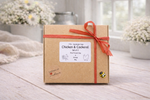 Load image into Gallery viewer, Box of Chicken &amp; Cockerel soap set with a red ribbon on a wooden surface.
