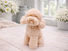 Load image into Gallery viewer, handmade vegan soap in the shape of a realistic sitting cockapoo or poodle sculpture, featuring detailed curly fur texture and a classic poodle groom, displayed on a rustic white wooden surface in a bright farmhouse decor setting.

