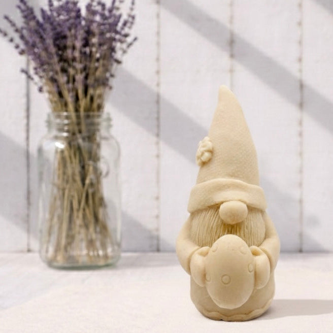 Handmade vegan soaps featuring a gorgeous gnome holding his easter egg packaged in beautiful eco friendly packaging.