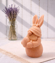 Load image into Gallery viewer, Handmade vegan soaps featuring a gorgeous gnome with easter bunny ears, holding his easter egg packaged in beautiful eco friendly packaging. 

