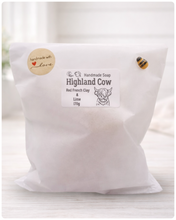 Load image into Gallery viewer, White bag of Highland Cow soap with a label on a white background
