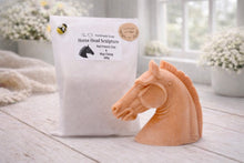 Load image into Gallery viewer, Horse head sculpture vegan soap next to its packaging on a farmhouse decor wooden surface
