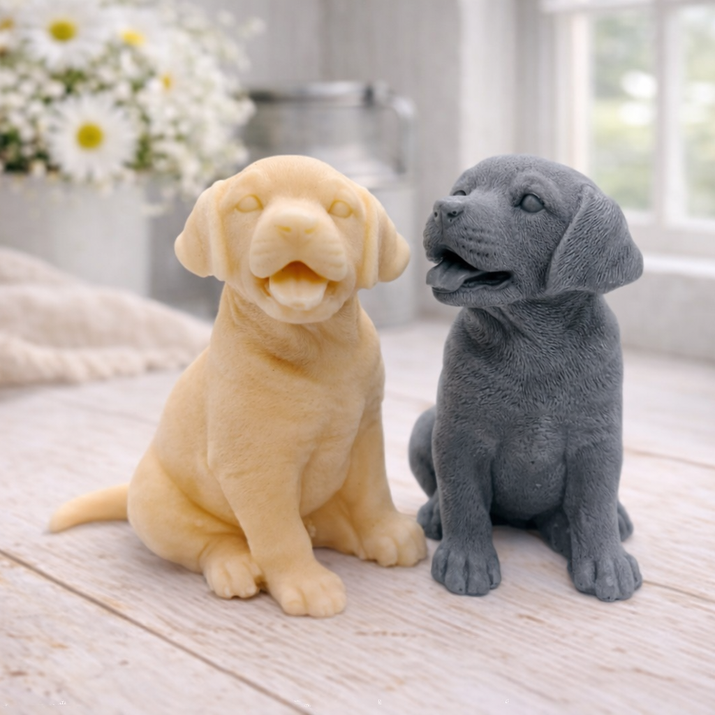 handmade vegan soap in the shape of a happy sitting Labrador retriever puppy sculpture with its tongue out, displayed in a bright farmhouse decor setting.