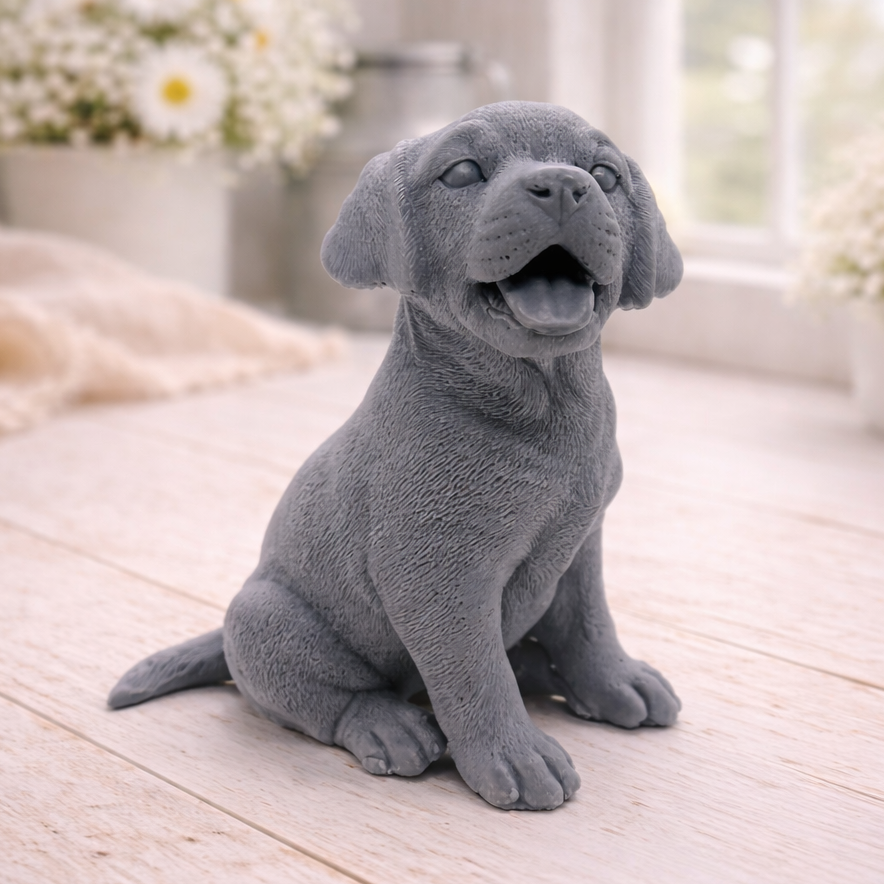 handmade vegan soap in the shape of a happy sitting Labrador retriever puppy sculpture with its tongue out, displayed in a bright farmhouse decor setting.