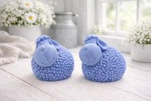Load image into Gallery viewer, Two handmade vegan soap gift set featuring two fluffy spring lambs with detailed wool texture, displayed on a weathered white wooden surface in a bright farmhouse decor room
