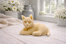 Load image into Gallery viewer, A highly detailed handmade vegan soap sculpted in the shape of a sitting cat with its tail curled around its paws, featuring realistic fur texture and a sweet facial expression, displayed on a light wooden surface.
