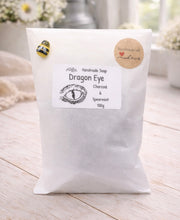 Load image into Gallery viewer, White soap packaging with a label on a wooden surface
