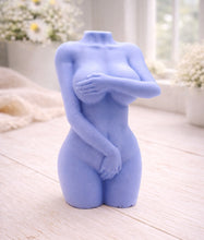 Load image into Gallery viewer, A 3D handmade vegan soap sculpted into a detailed female torso with soft, realistic curves and defined musculature and displayed in a bright farmhouse setting.
