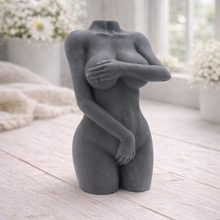 Load image into Gallery viewer, A 3D handmade vegan soap sculpted into a detailed female torso with soft, realistic curves and defined musculature and displayed in a bright farmhouse setting.
