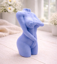 Load image into Gallery viewer, A 3D handmade vegan soap sculpted into a detailed female torso with soft, realistic curves and defined musculature and displayed in a bright farmhouse setting.
