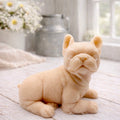 A highly detailed handmade vegan soap in a sophisticated pink tone, sculpted in the shape of a French bulldog puppy sitting upright with its characteristic large ears and wrinkled face, displayed on a light wooden surface.