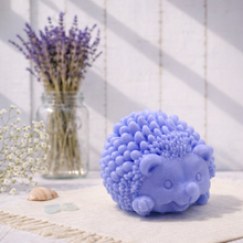 Load image into Gallery viewer, Handmade vegan soaps featuring a cute waving hedgehog, packaged in beautiful eco friendly packaging. 
