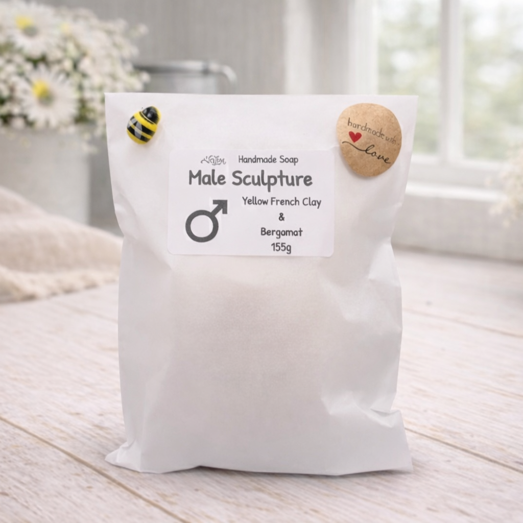 Handmade soap packaging with a label on a wooden surface