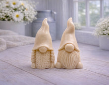 Load image into Gallery viewer, A pair of handmade vegan soaps, featuring a Mr and Mrs Gnome (gonk) set; one with a full textured beard and the other with thick braided plaits, both wearing tall, pointed hats. Gift boxed. 

