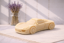 Load image into Gallery viewer, Sports Car-shaped vegan soap gift on a white surface with a blurred background
